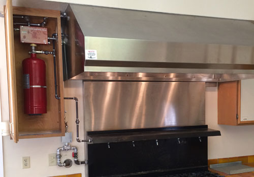 Kitchen hood fire suppression in restaurant